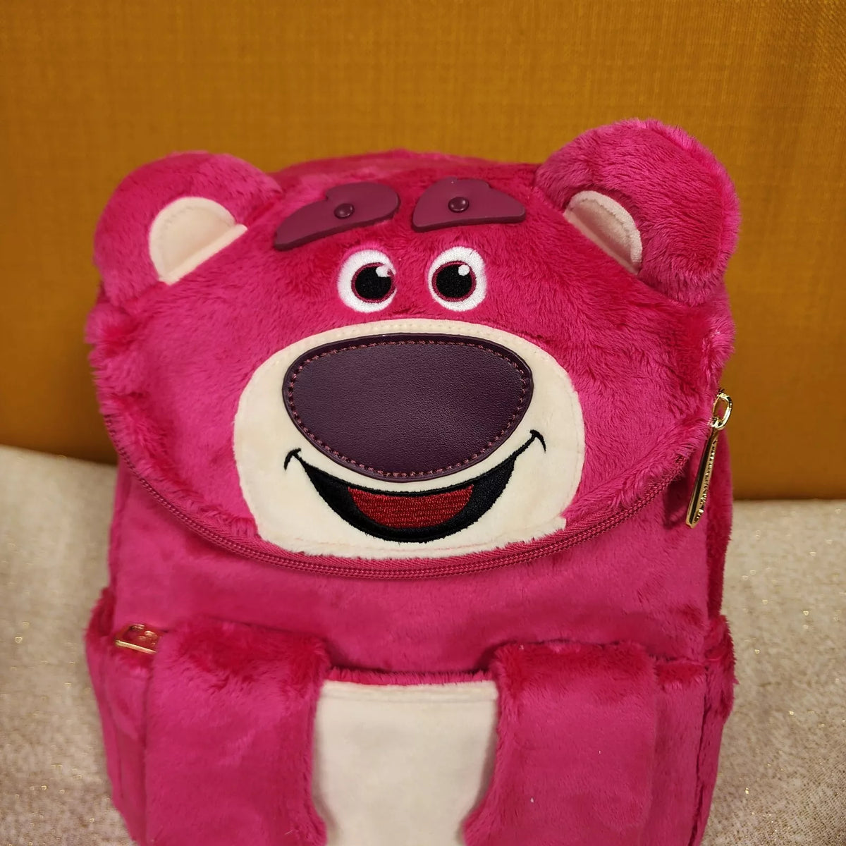 NWT. Disney’s Fluffy mini Backpack. Toy Story Lotso pink furry backpack Disney Pixar Primark Toy Story Lotso Bear | Mercari main image 4