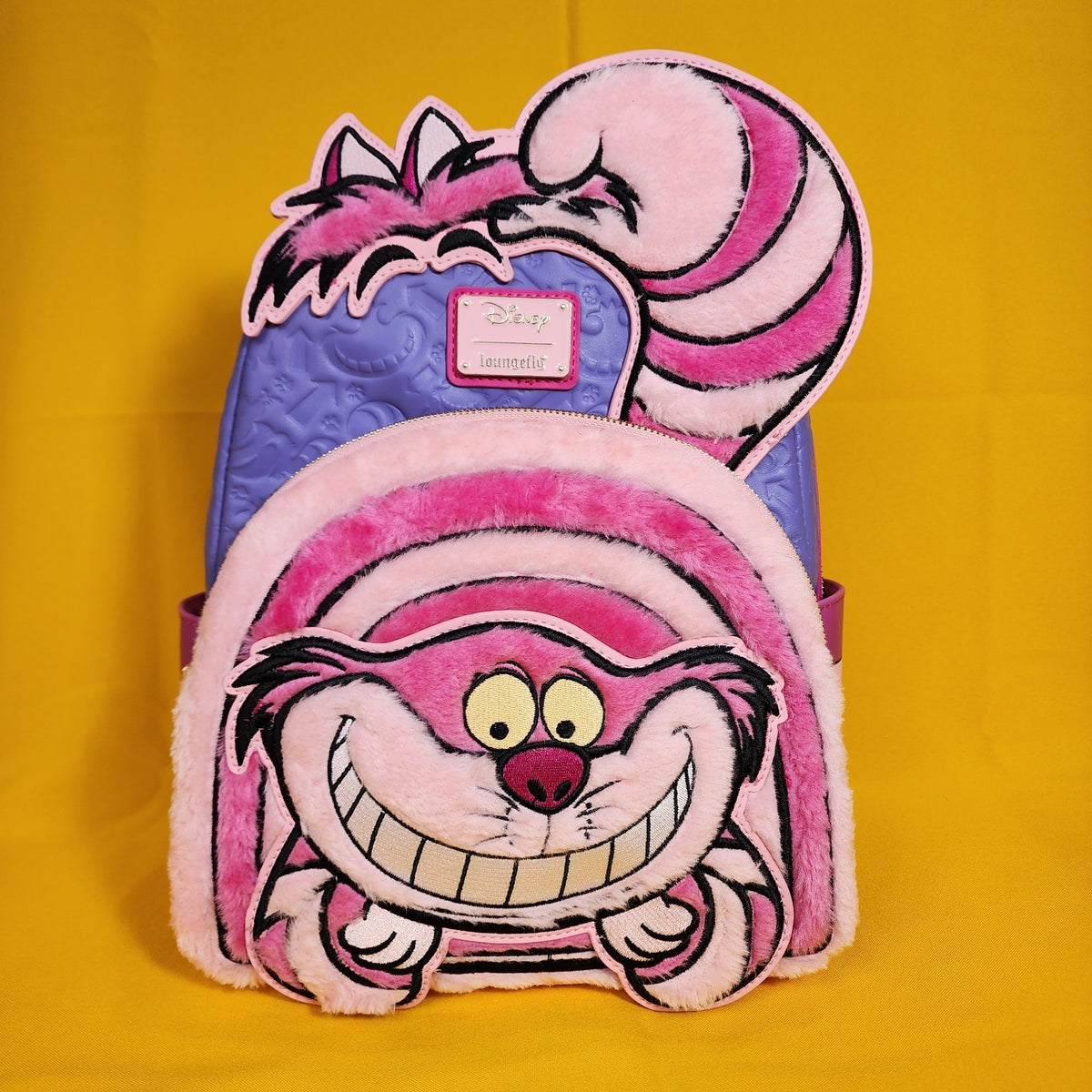alice in wonderland loungefly mini backpack Loungefly Disney Alice in Wonderland Cheshire Cat Fuzzy Pink Mini Back – Get Lojos Mojo