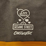 Cakeworthy Care Bears X Sesame Street Cookie Monster Cookie Moon Black Tote Bag