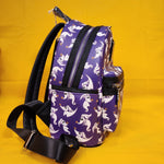 Loungefly Disney NBC ZERO Purple AOP GIow-in-the-Dark Mini Backpack